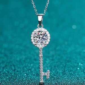 Elegant Sterling Silver Moissanite Key Pendant